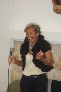 Marika sining the Haitian song she sung while carving "Grace."